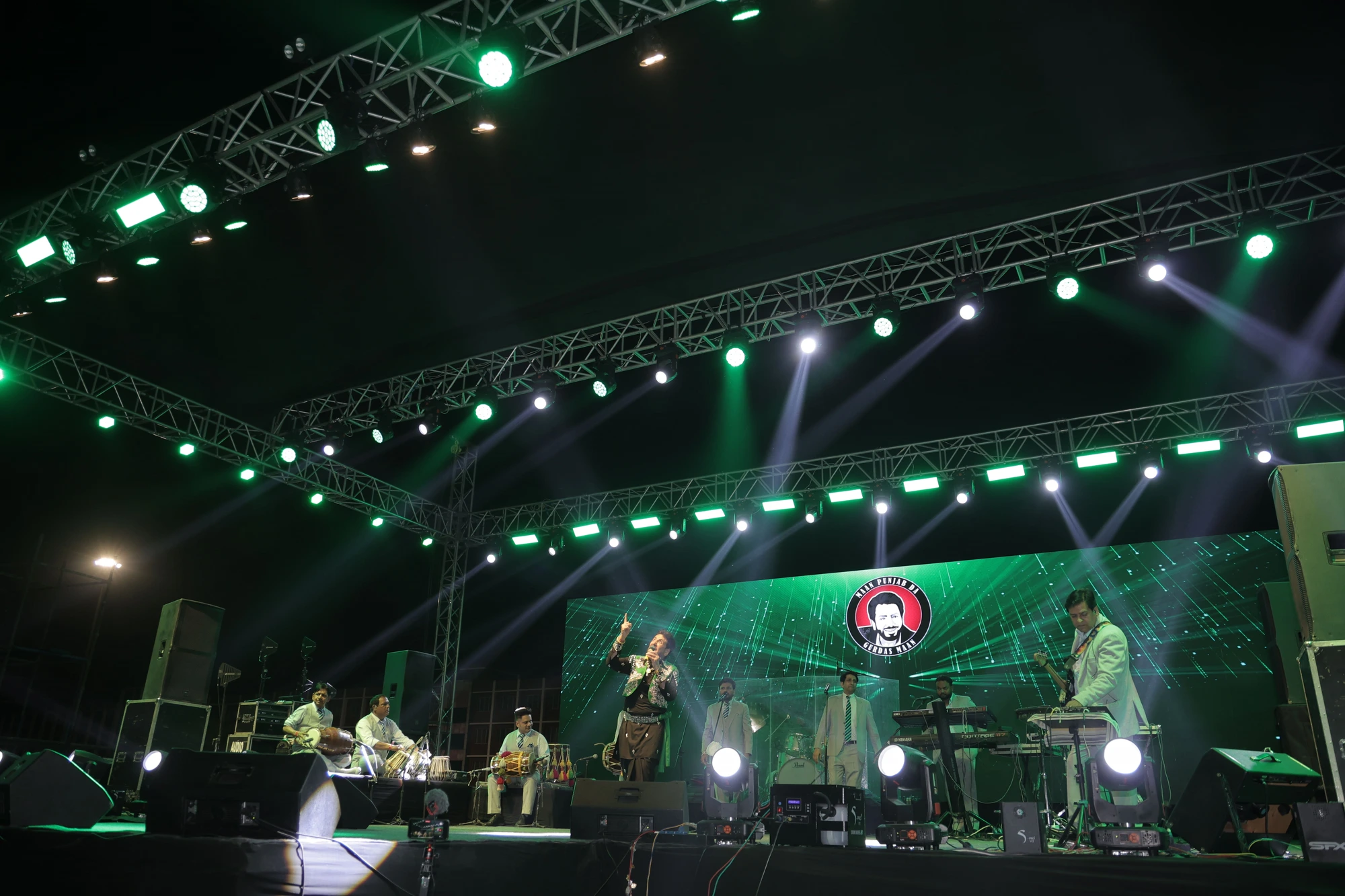 Live concert stage setup with truss lighting and LED wall by Global Events, Rohtak